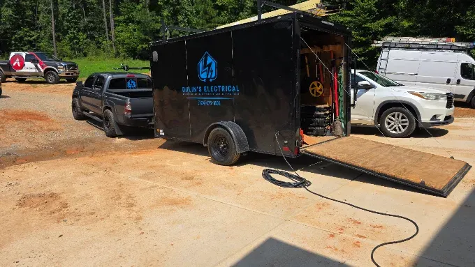 Dulin's Electrical work trailer at a job site